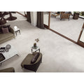 Light gray matte-finished ceramic floor tiles with subtle veining from Ateliers 1971 Silk Anti-slip collection