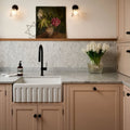 Athens Carrara Marble Mosaic white marble herringbone mosaic backsplash behind a white farmhouse sink