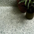 Herringbone patterned athens mint marble mosaic tile floor in white and gray tones