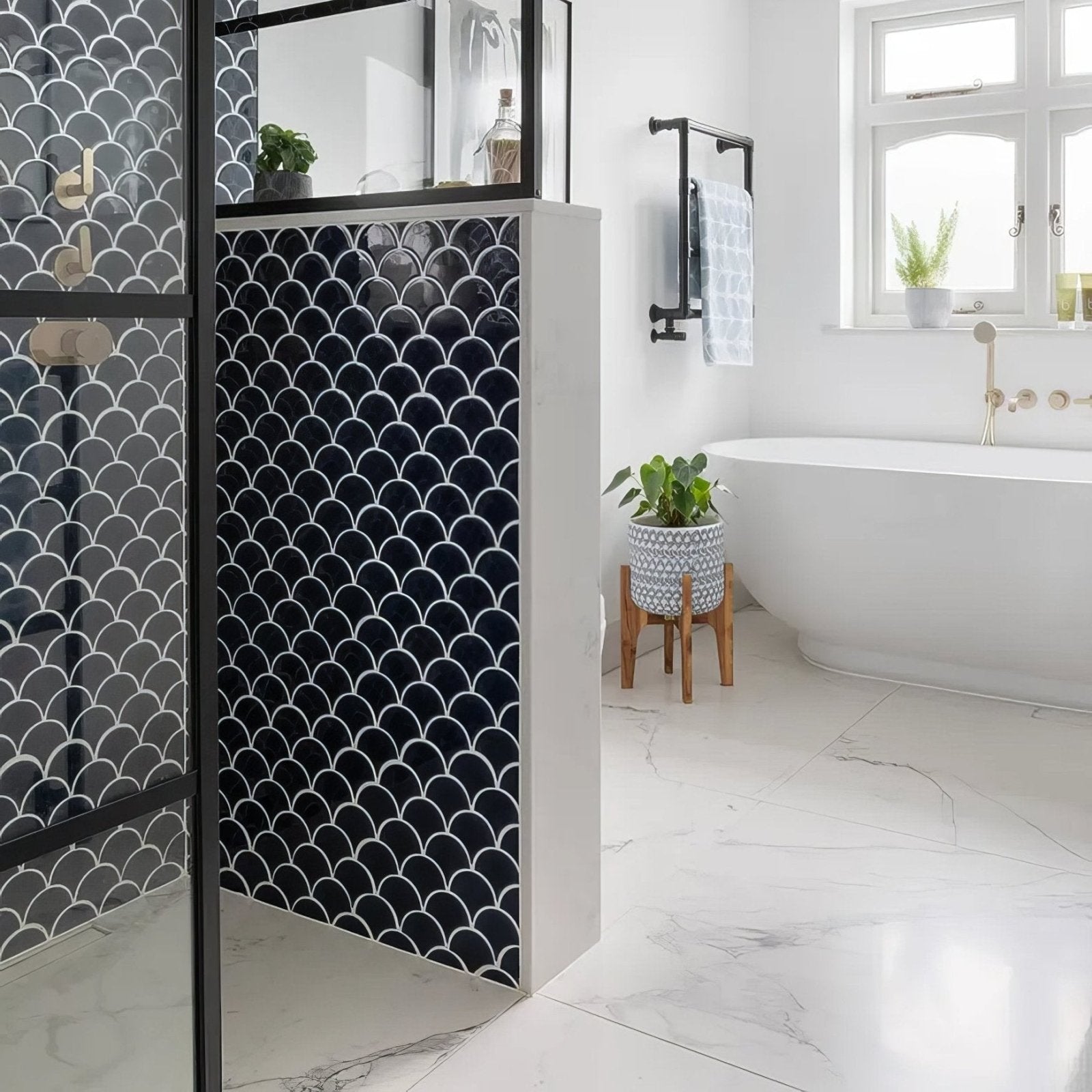 Black and white scalloped atlantis porcelain mosaic navy tile partition with sleek modern design