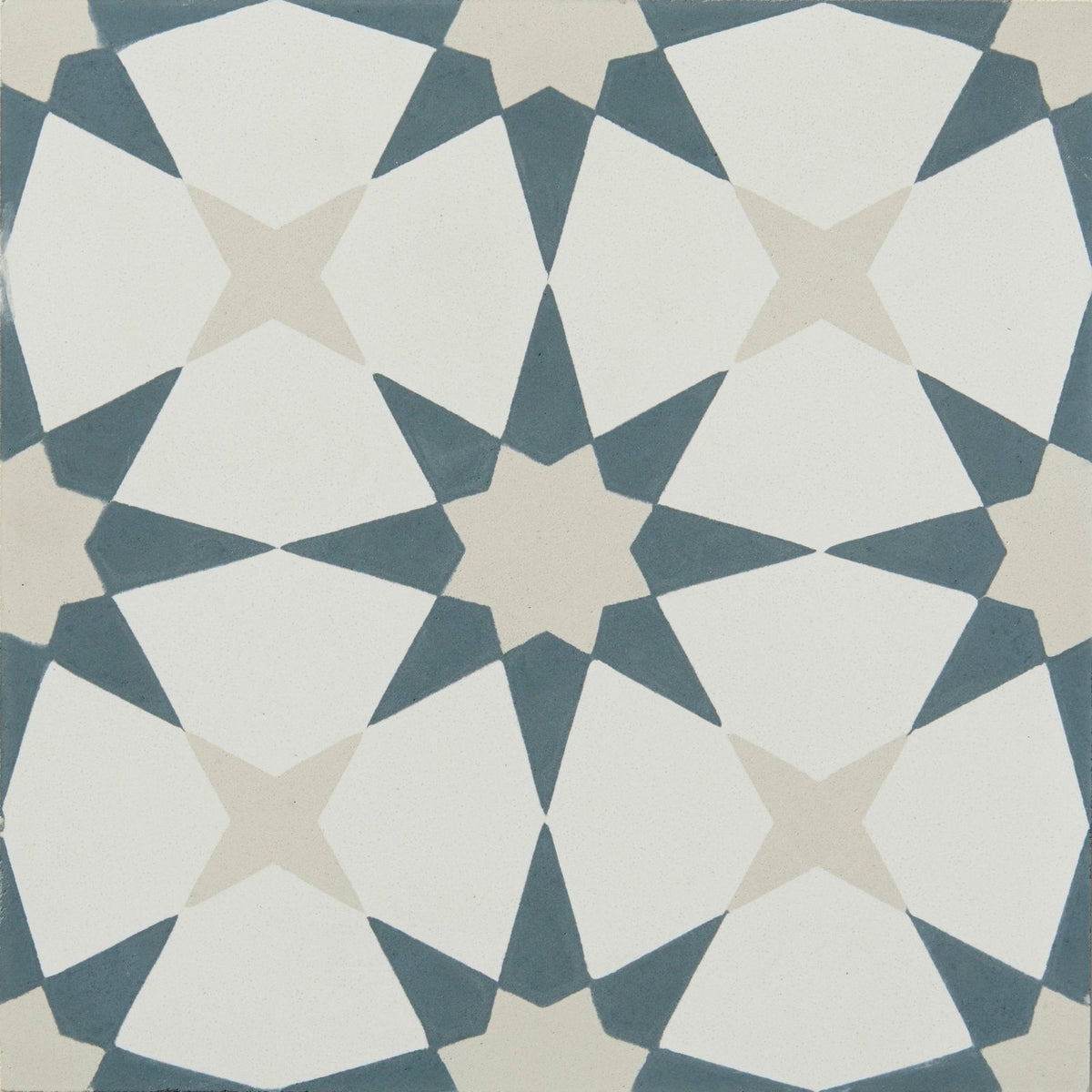 Geometric atlas porcelain denim tile featuring a repeating star pattern in white slate blue and beige
