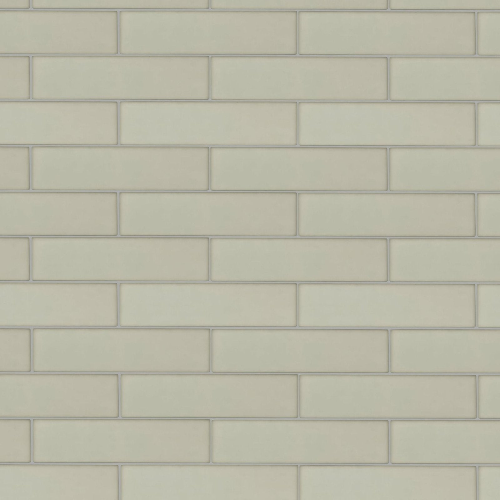Beige rectangular subway tile with subtle gray grout lines in aurora abisko brick glass mosaic design