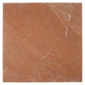 A square slab of warm terracotta colored avalon tumbled rosso marble tile with subtle white veining
