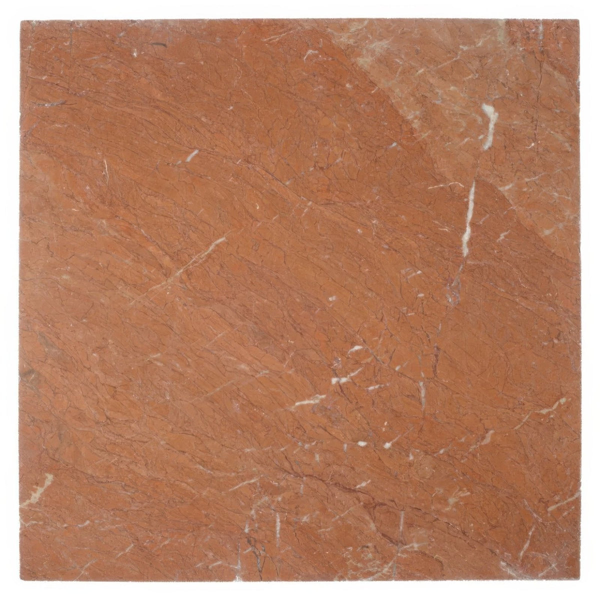 A square slab of warm terracotta colored avalon tumbled rosso marble tile with subtle white veining