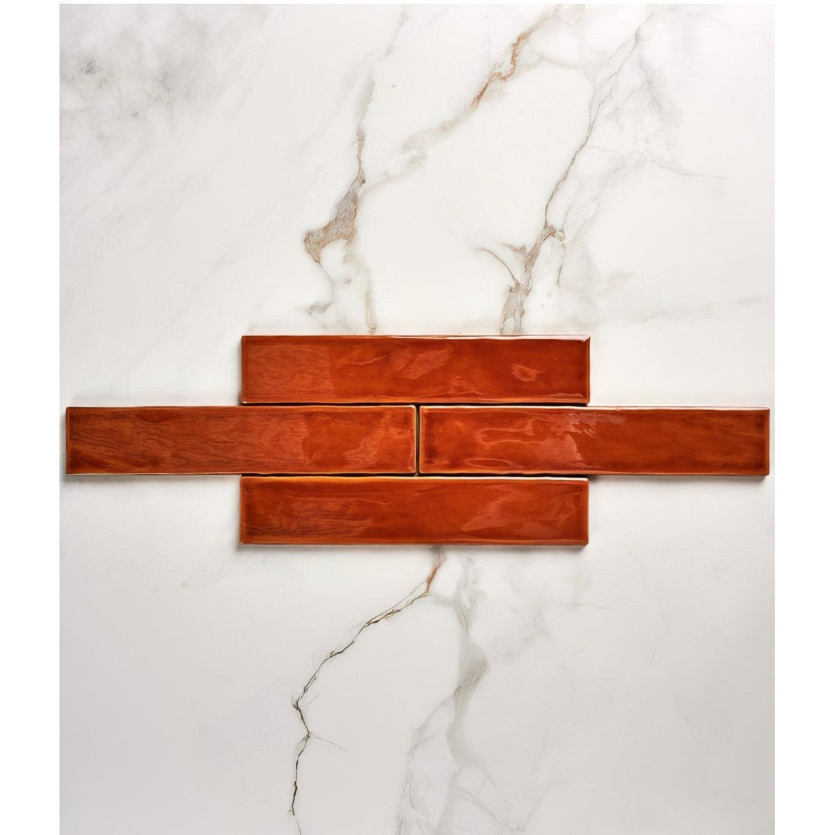 Avebury ceramic burnt caramel tiles with rich glossy terracotta finish arranged in overlapping brick pattern