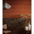 Avebury ceramic burnt caramel wall tiles feature two-toned vertical design with terracotta and dark speckled stone