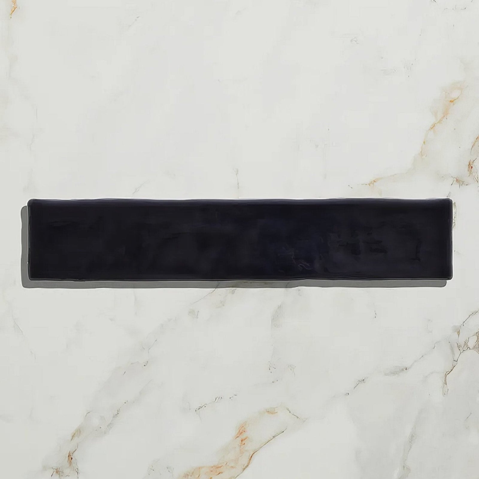 Black velvet headband featuring avebury ceramic ink design with a smooth soft fabric texture