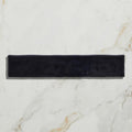 Black velvet headband featuring avebury ceramic ink design with a smooth soft fabric texture