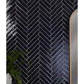 Avebury ceramic ink black glossy herringbone patterned ceramic tiles with white grout lines for wall or floor use
