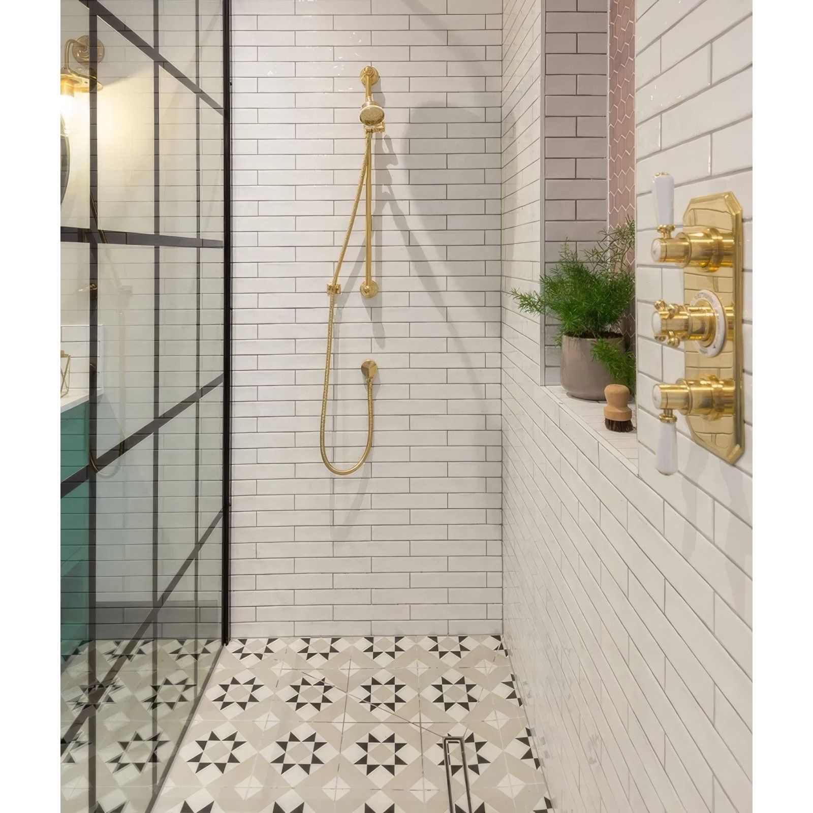 Gold-toned shower fixture with sleek modern design and polished brass finish from avebury ceramic milk white collection