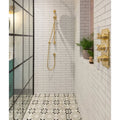 Gold-toned shower fixture with sleek modern design and polished brass finish from avebury ceramic milk white collection