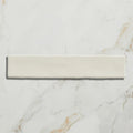 Cream-colored rectangular avebury ceramic parchment tile with smooth glossy finish suitable for flooring or walls