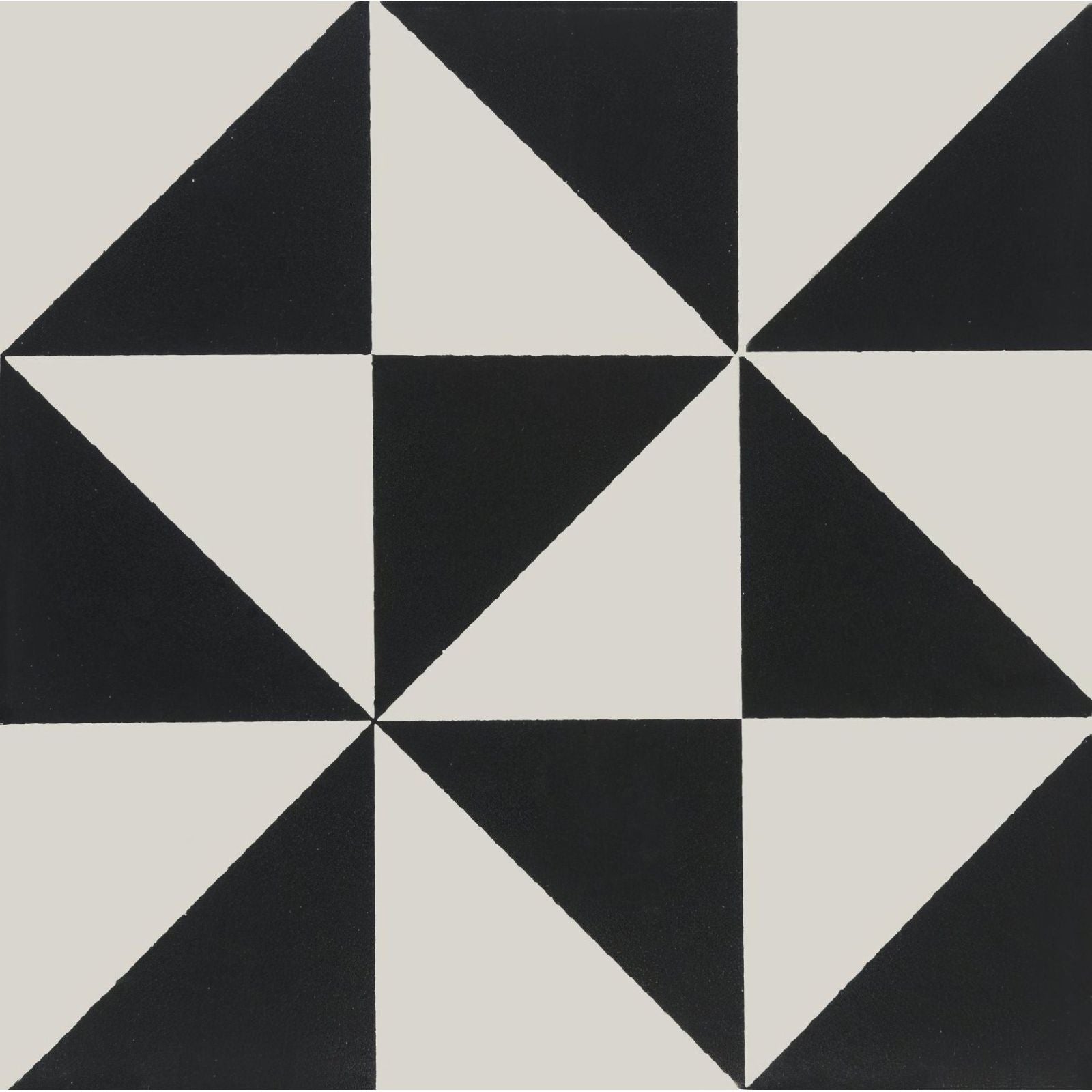 Avignon black on dover white geometric tile featuring a black and off-white starburst pattern for flooring or walls