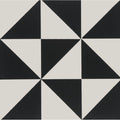 Avignon black on dover white geometric tile featuring a black and off-white starburst pattern for flooring or walls