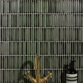 Bamboo Lustre Porcelain Mosaic Forest dark green ribbed porcelain mosaic behind a brass tap