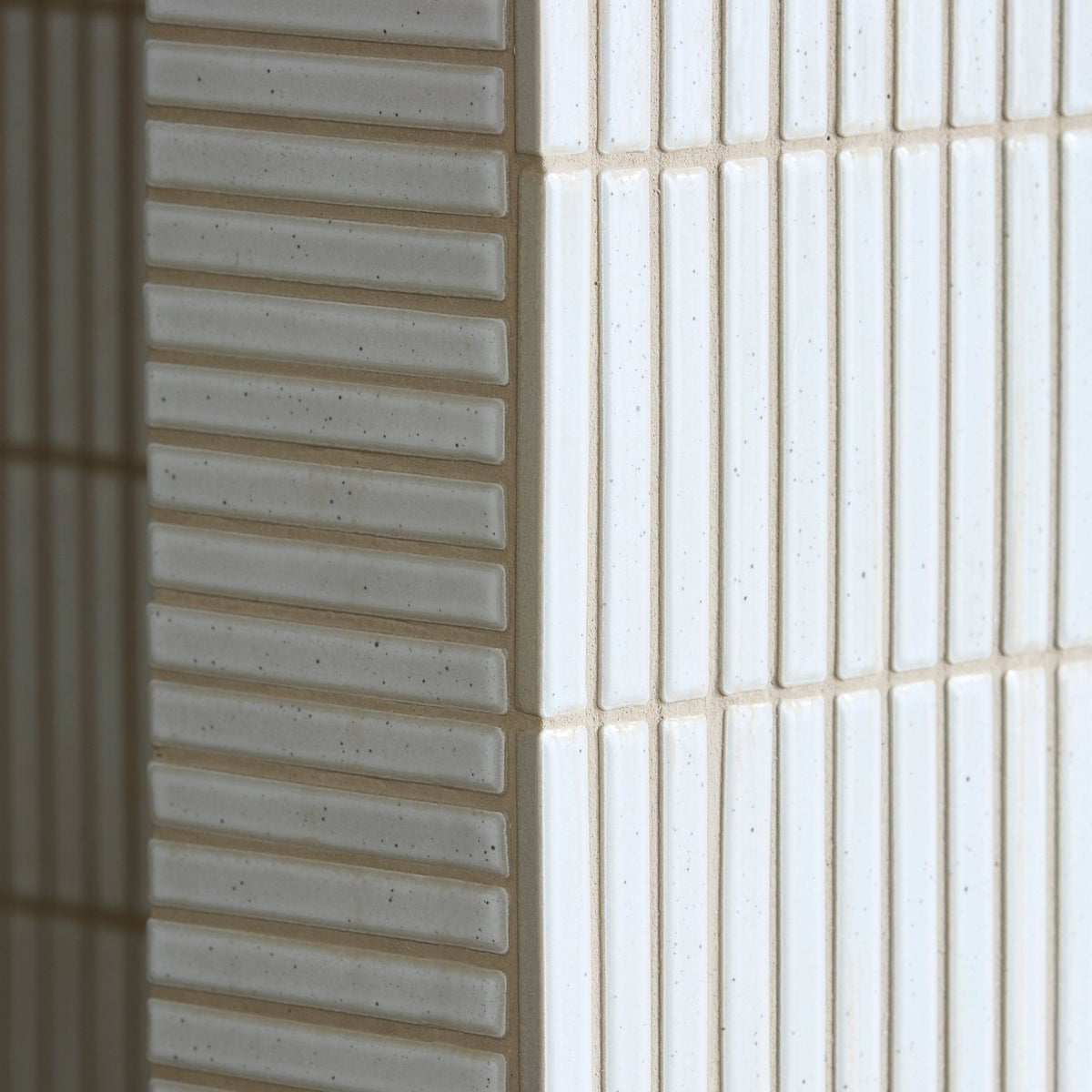 Bamboo porcelain mosaic vintage white white ceramic tiles with subtle speckled texture and vertical ridges in neat rows