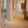 Beige stone tile flooring with smooth polished bath limestone artisan honed finish for elegant interiors
