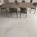 Shellstone brushed limestone 61 x 30.5cm plank shown in natural daylight