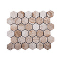 Valencia tumbled travertine hexagon mosaic sheet in even sandy beige with softened edges