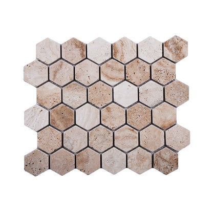 Valencia tumbled travertine hexagon mosaic sheet in even sandy beige with softened edges