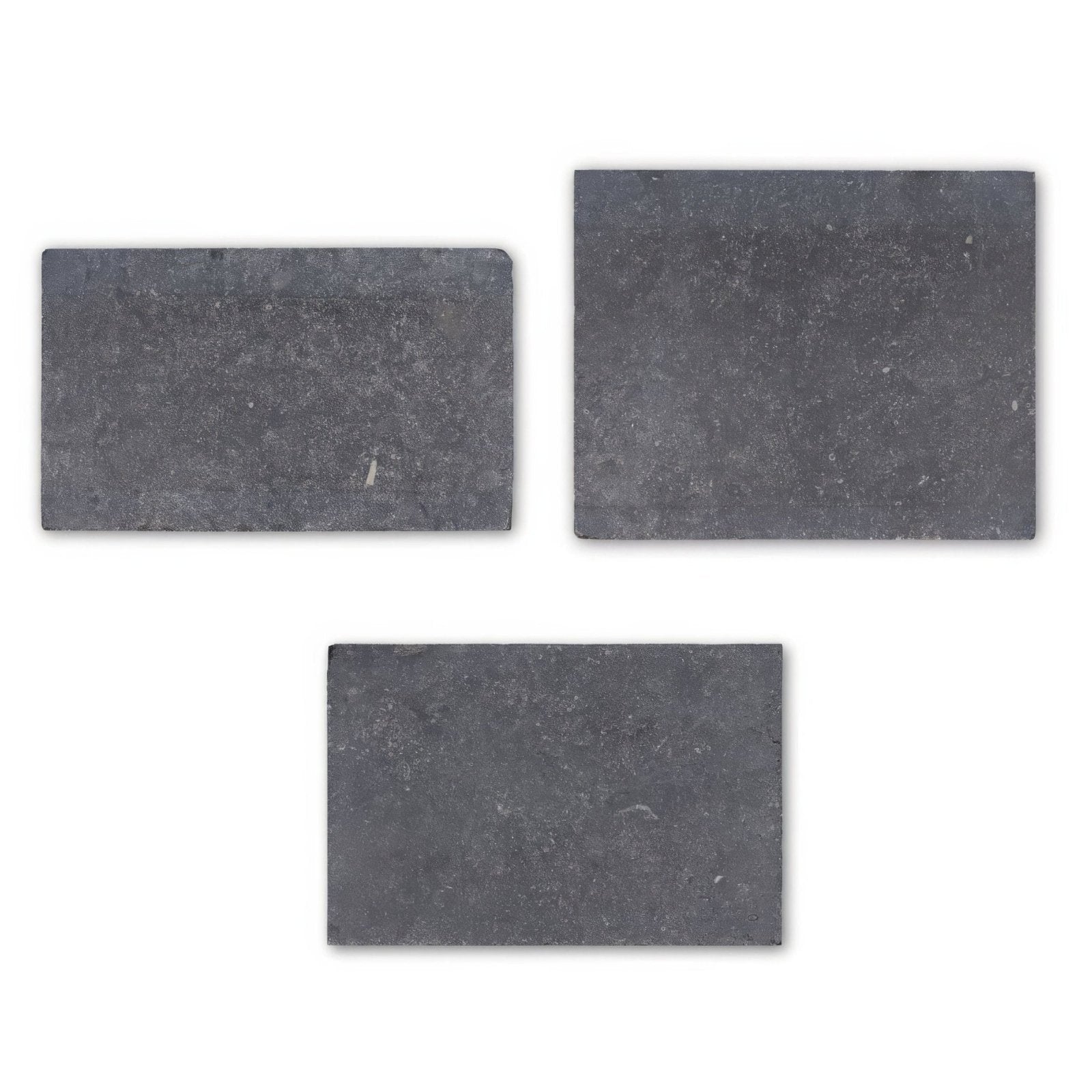 Dark gray rectangular Belgian Bleu tumbled stone tiles with a textured natural surface and light pillow edge honed finish