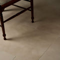 Beige rectangular bergamo limestone floor tiles with subtle natural veining and a lightly seasoned matte finish