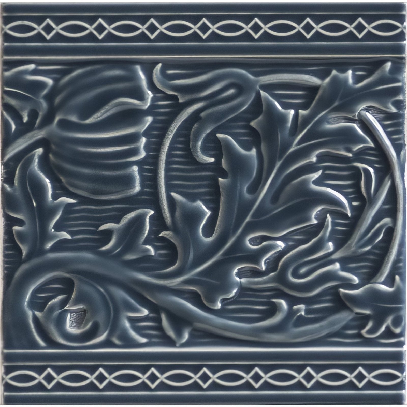 Berkeley on ascot blue dark blue ceramic tile with raised ornate floral and leaf patterns framed by white border motifs