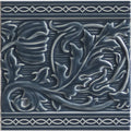 Berkeley on ascot blue dark blue ceramic tile with raised ornate floral and leaf patterns framed by white border motifs