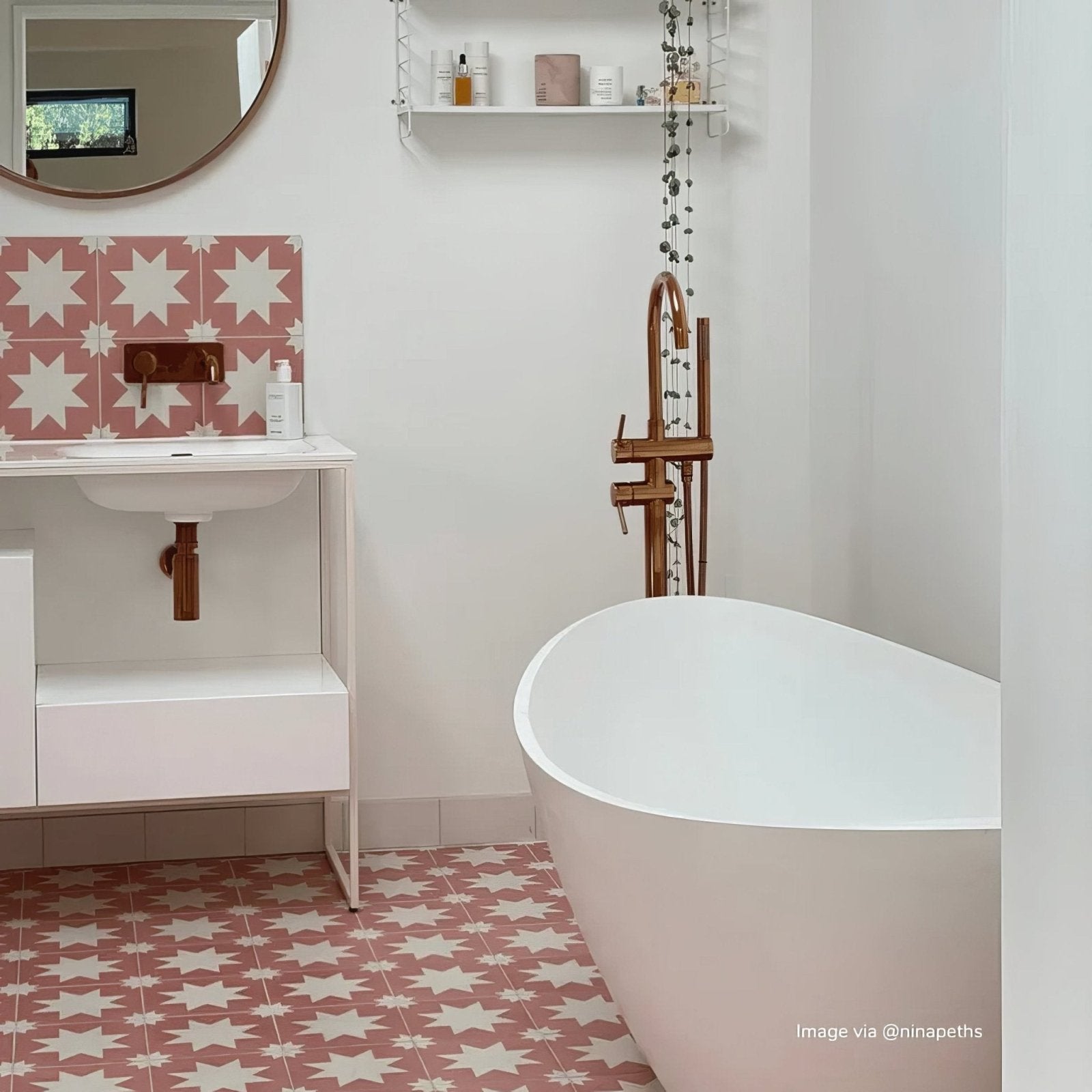 White freestanding porcelain bathtub bert and may pink pradena with sleek modern design and smooth surface