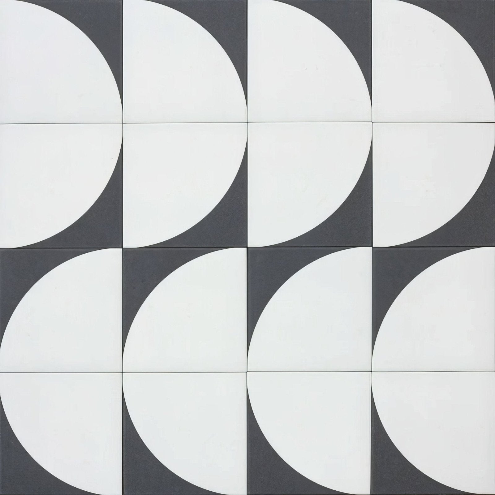 Black and white geometric circular pattern porcelain tile from bert and may arco old iron collection
