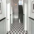 Bert & May black alalpardo porcelain floor tiles with black and white geometric triangle pattern design