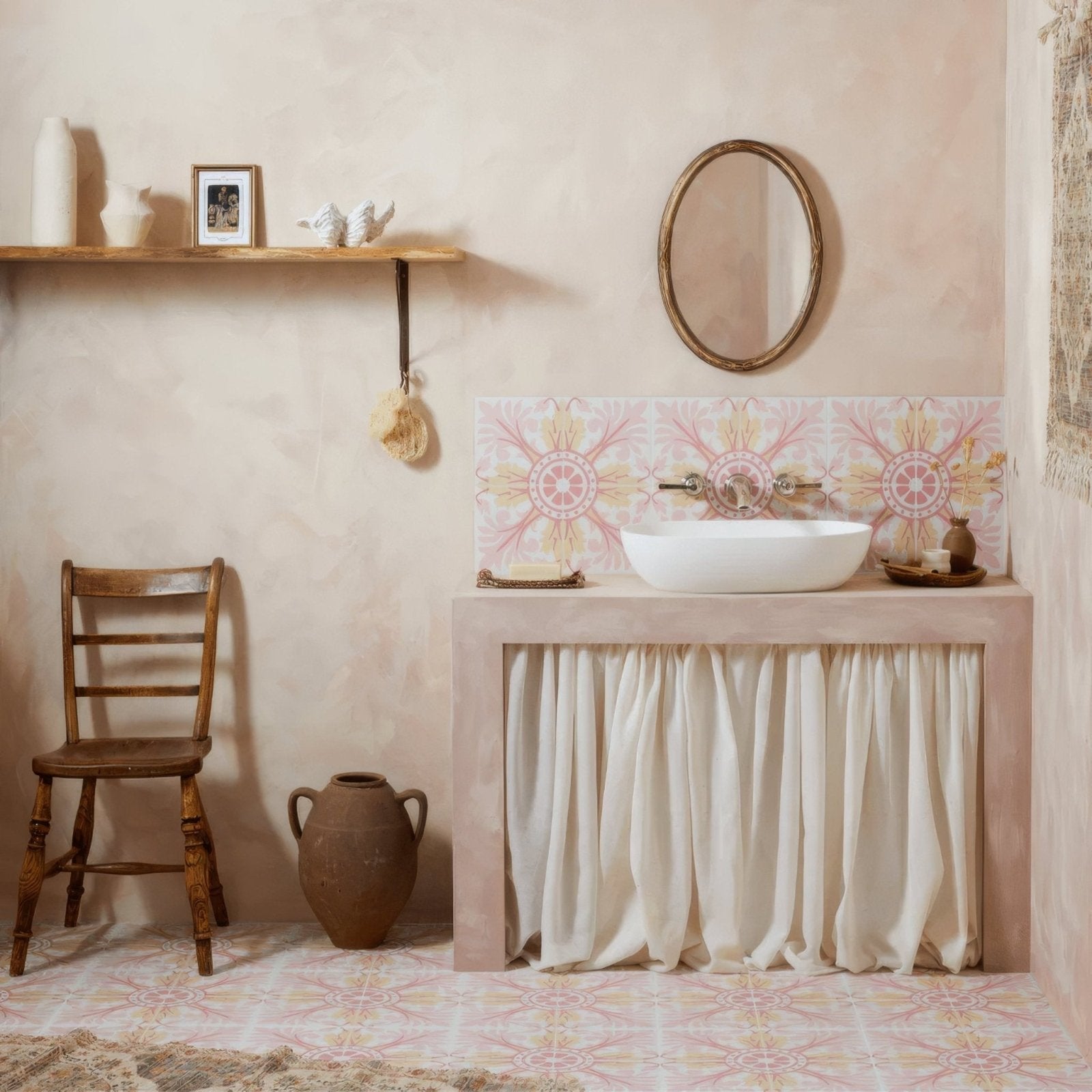White ceramic vessel sink with matte porcelain finish and integrated faucet set against patterned tile backsplash