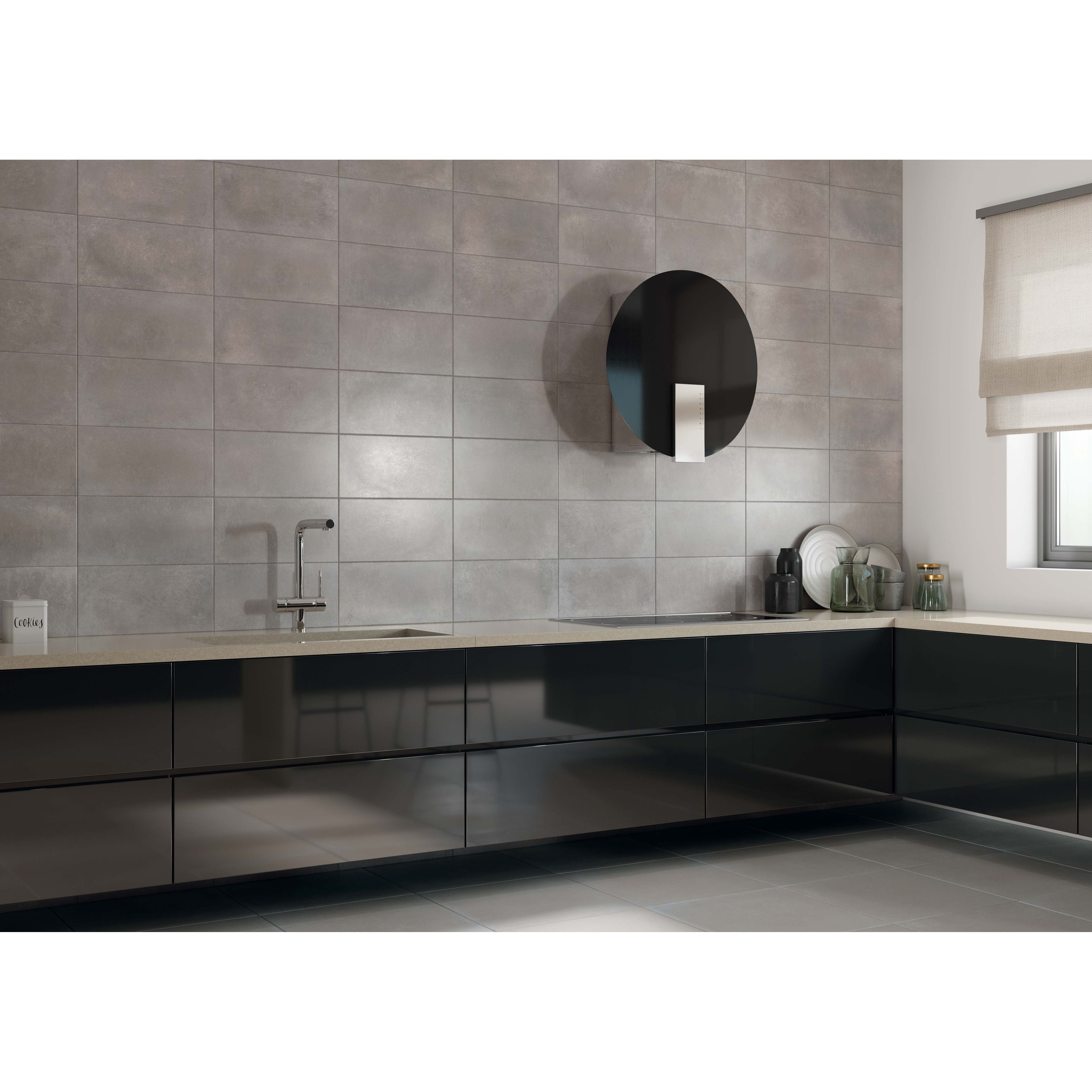 Modern black glossy kitchen cabinets paired with beton grey matt 25 x 50cm wall tile for a sleek minimalist design