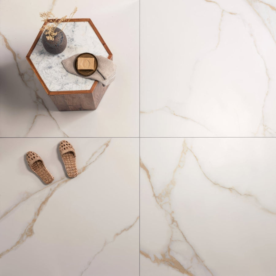Bianco oro polished porcelain floor tile 90 x 90cm with white marble effect and subtle gold veining