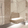 Biscotti 25mm Square shimmering beige mother-of-pearl mosaic on a floating bench with integrated underlighting