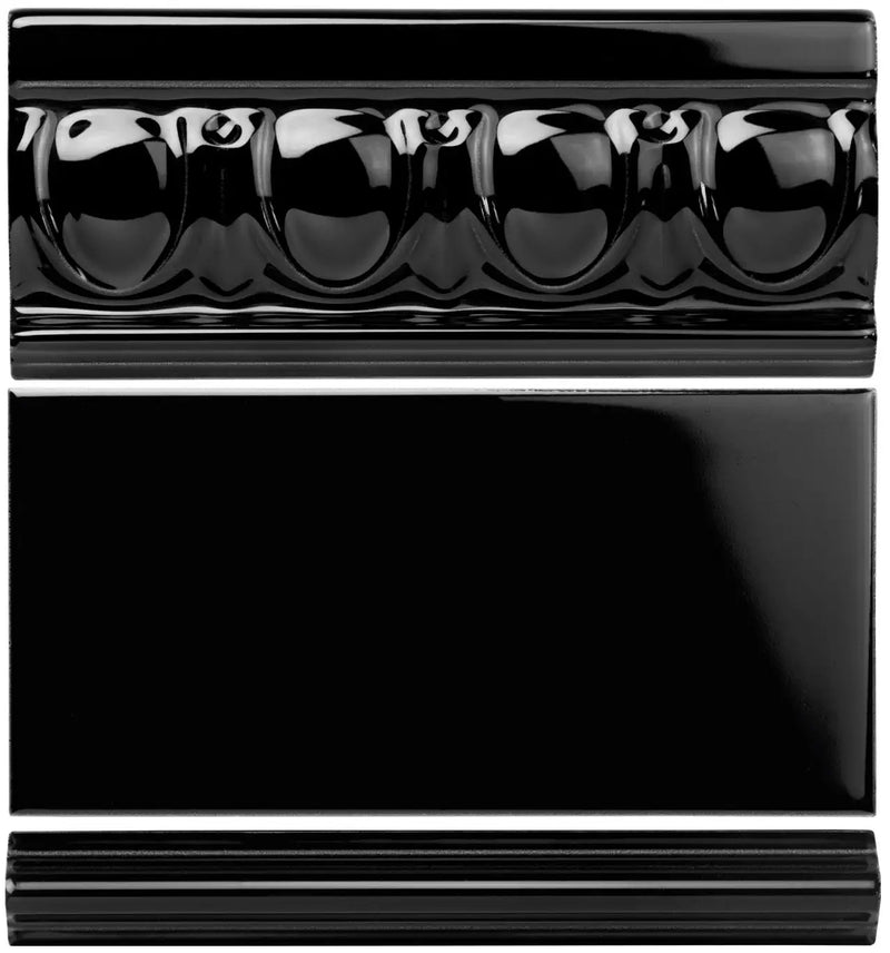 Black glossy ceramic crown molding with a decorative bead pattern.