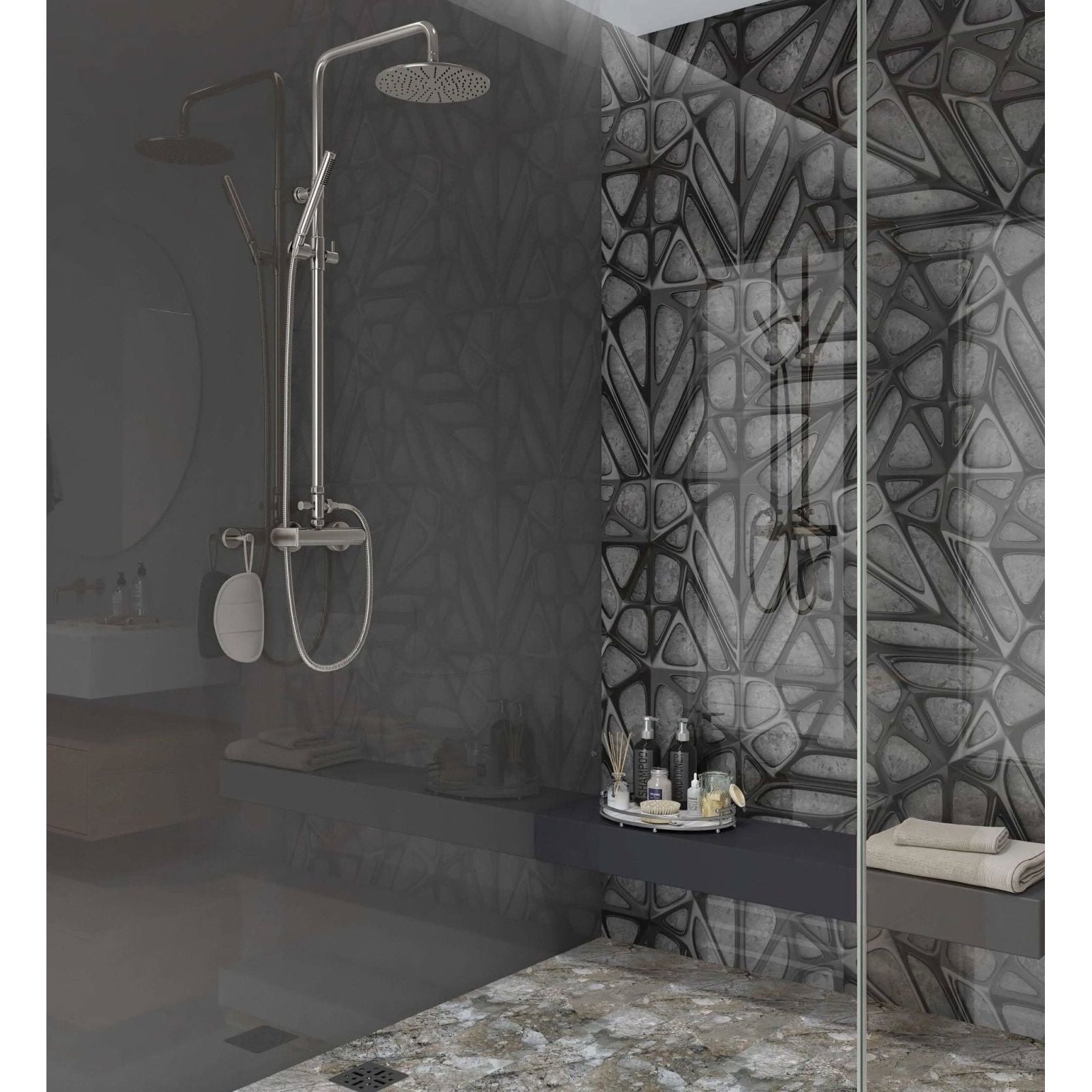 Modern chrome-finished showerhead with sleek curved design and perforated spray face on black lattice grid concrete panel