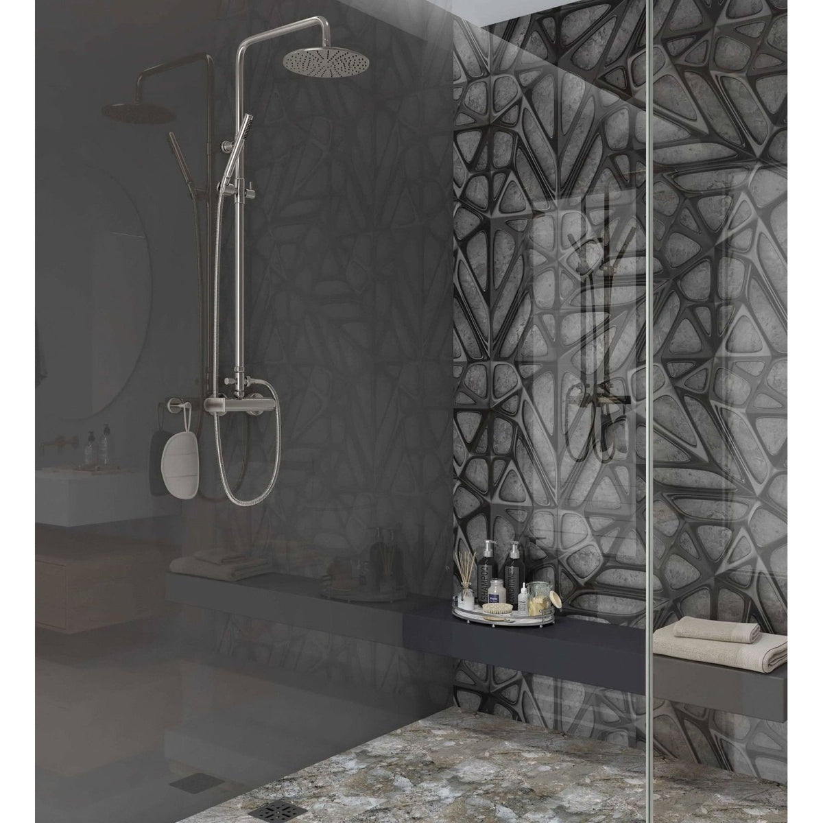 Modern chrome-finished showerhead with sleek curved design and perforated spray face on black lattice grid concrete panel