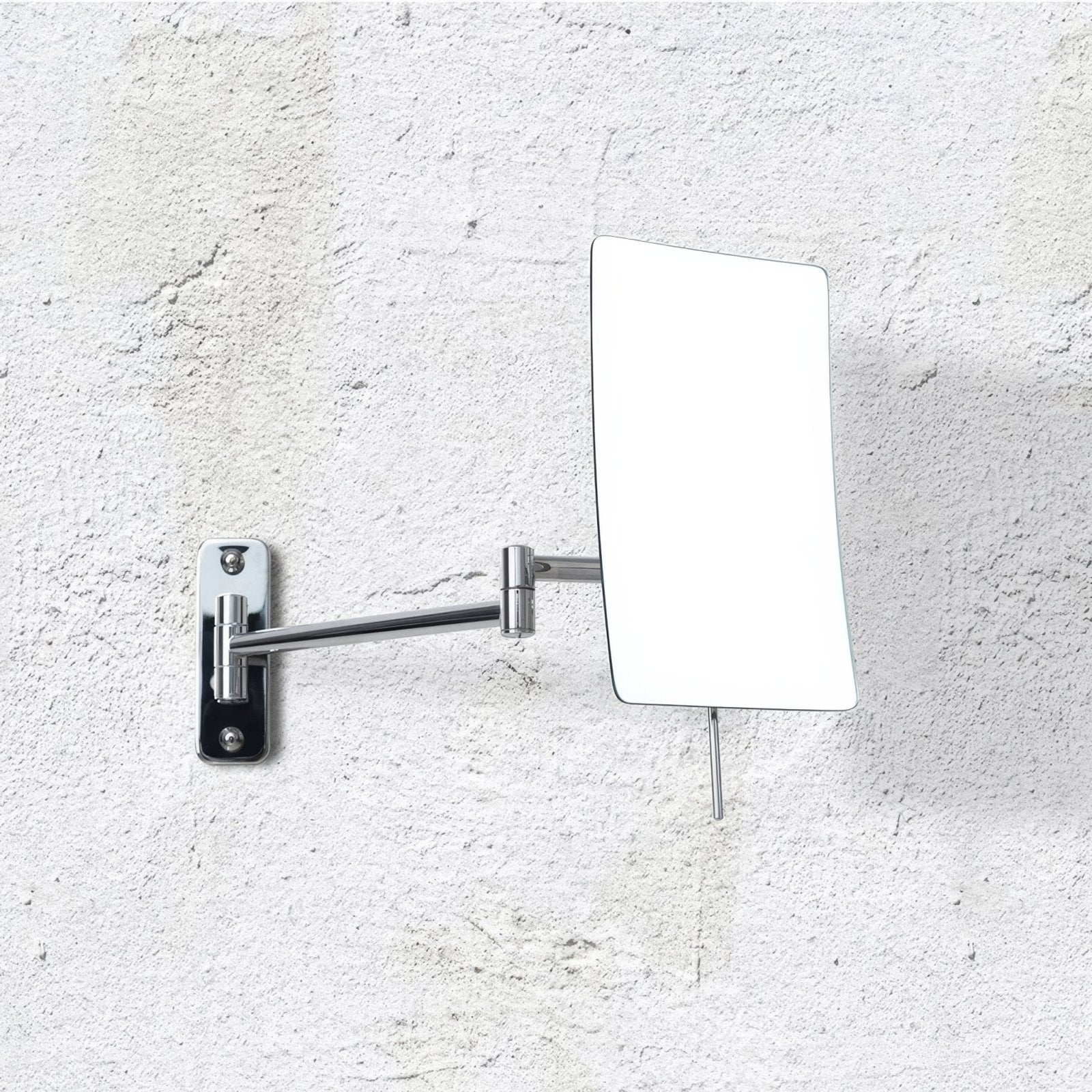 Chrome finished blake magnifying 5x wall mirror with sleek articulated arm and rectangular reflective surface mounted on wall