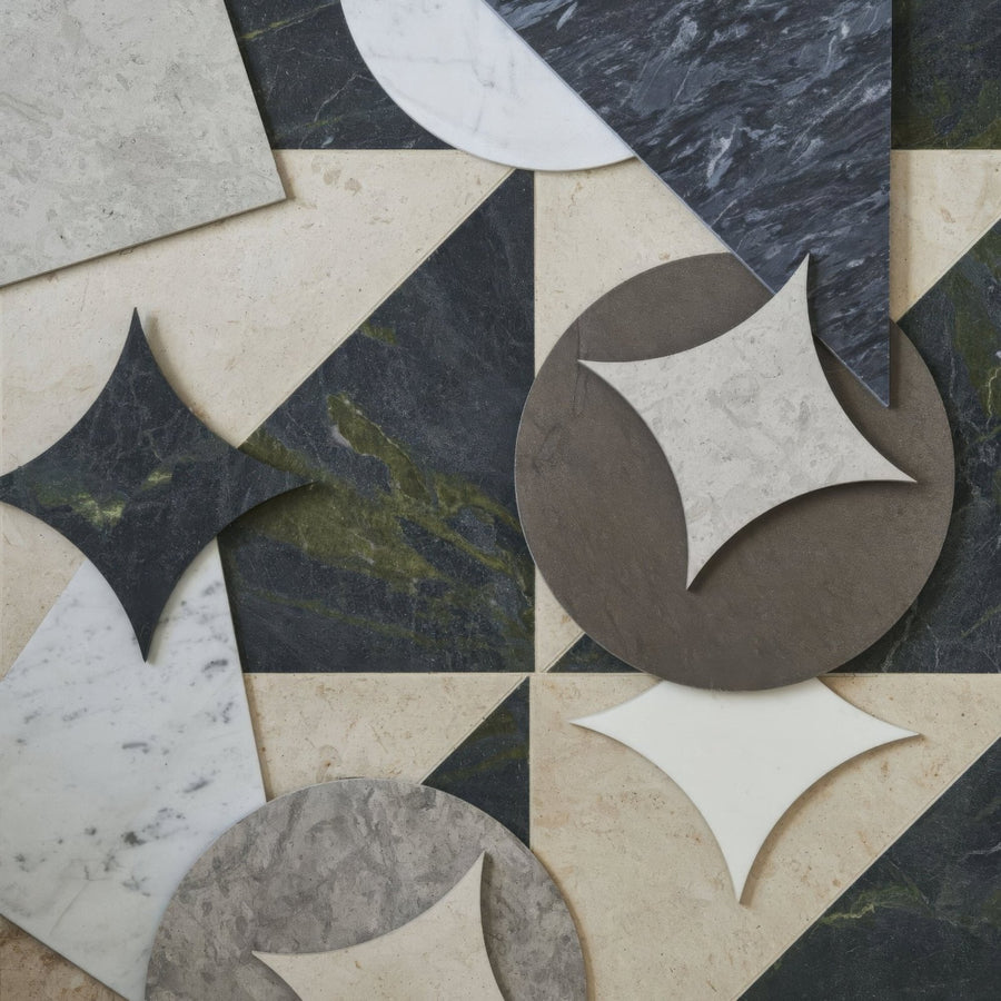 Geometric marble mosaic tiles in black white and beige with star-shaped cutouts from blends carrara star collection