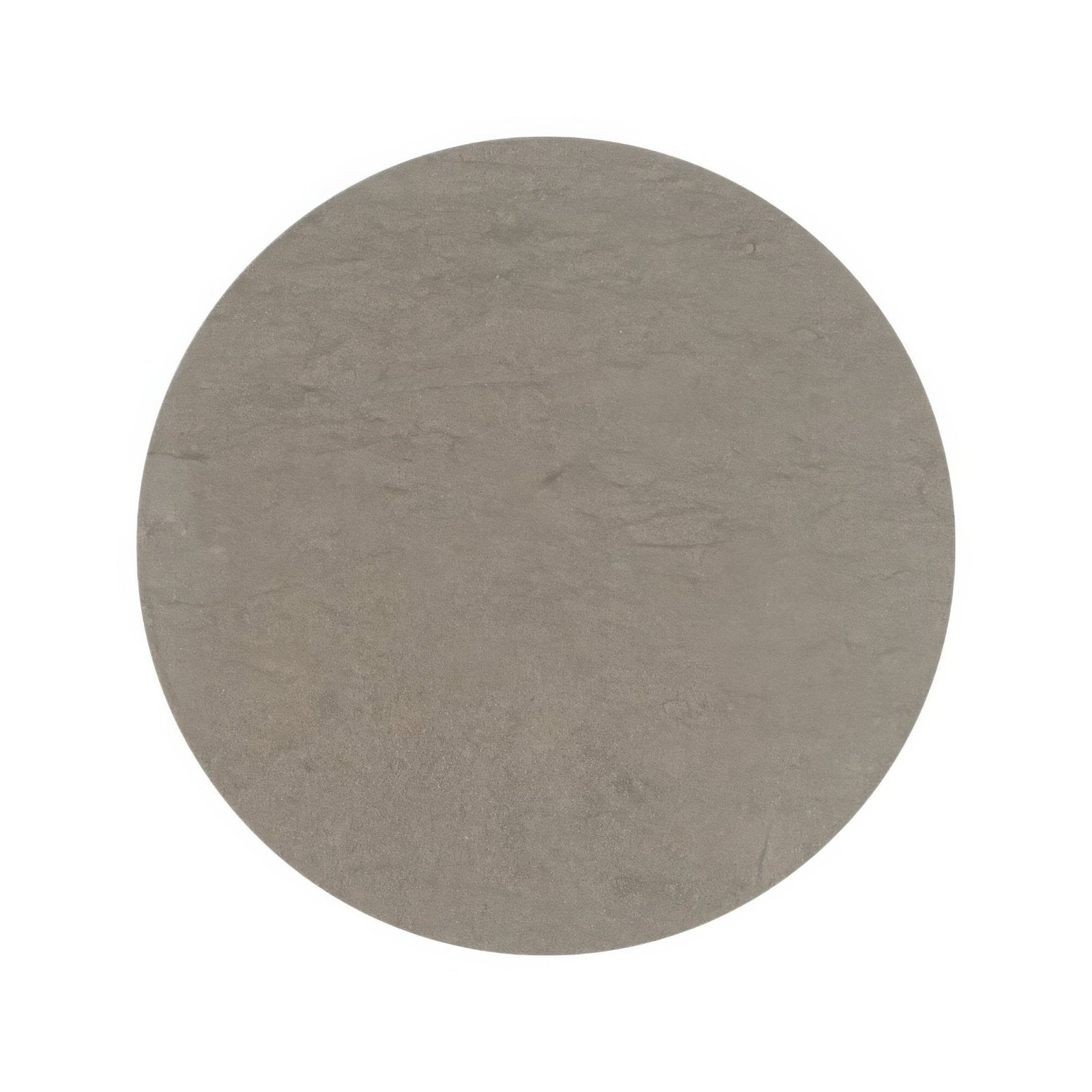 A circular matte gray stone slab with a subtly textured surface from the blends castano circle collection