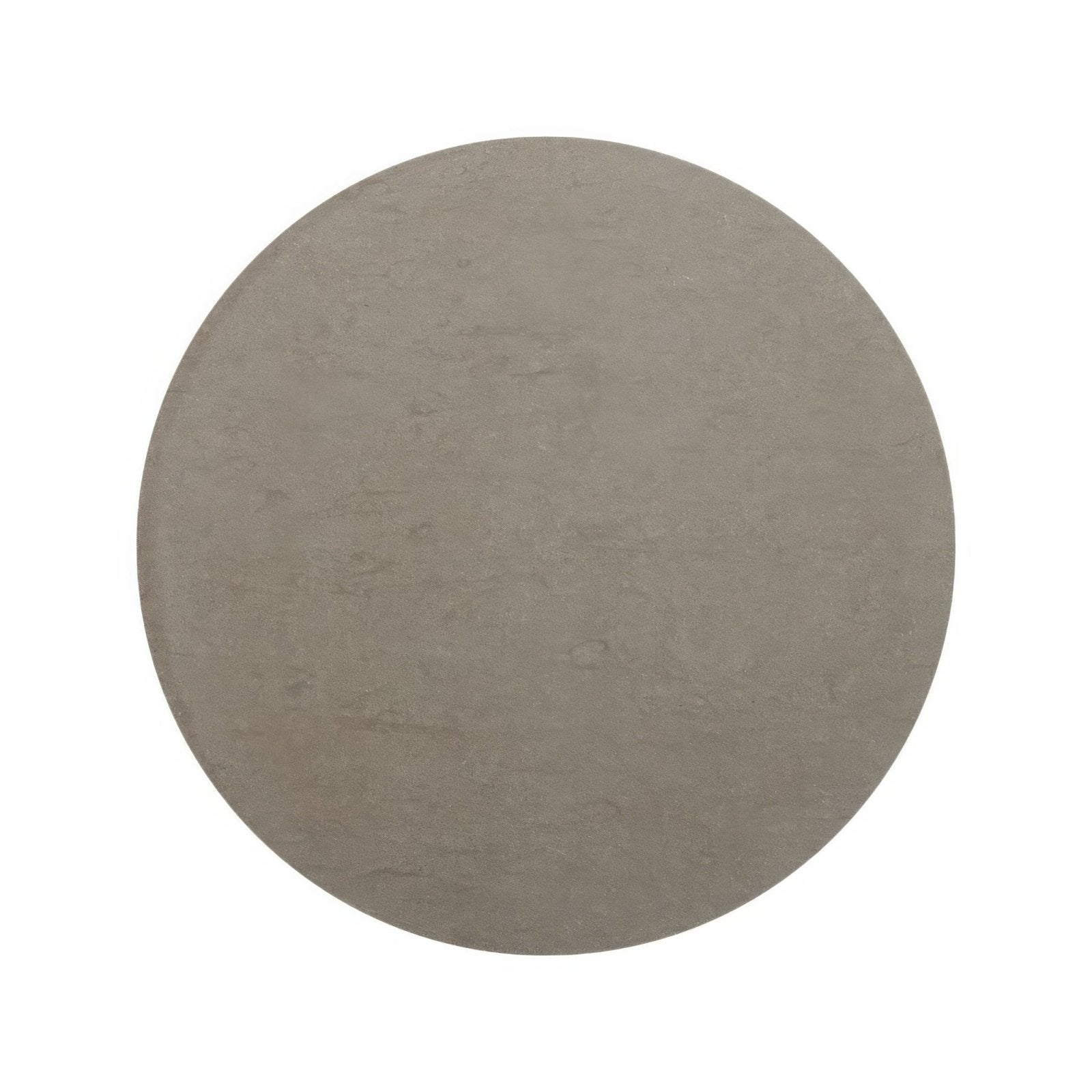 A circular matte gray stone slab with a subtly textured surface from blends castano circle collection