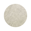 Circular beige marble tile with subtle gray veining from blends grigio circle collection