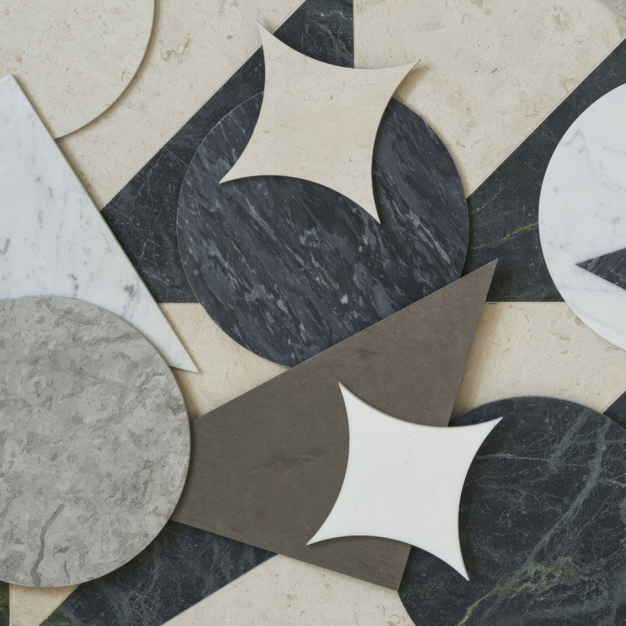 Geometric black white and gray marble mosaic tiles with star shaped cutouts for decorative surfaces blends grigio star