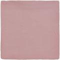 A square matte ceramic tile in soft dusty rose from the blossom field tile collection