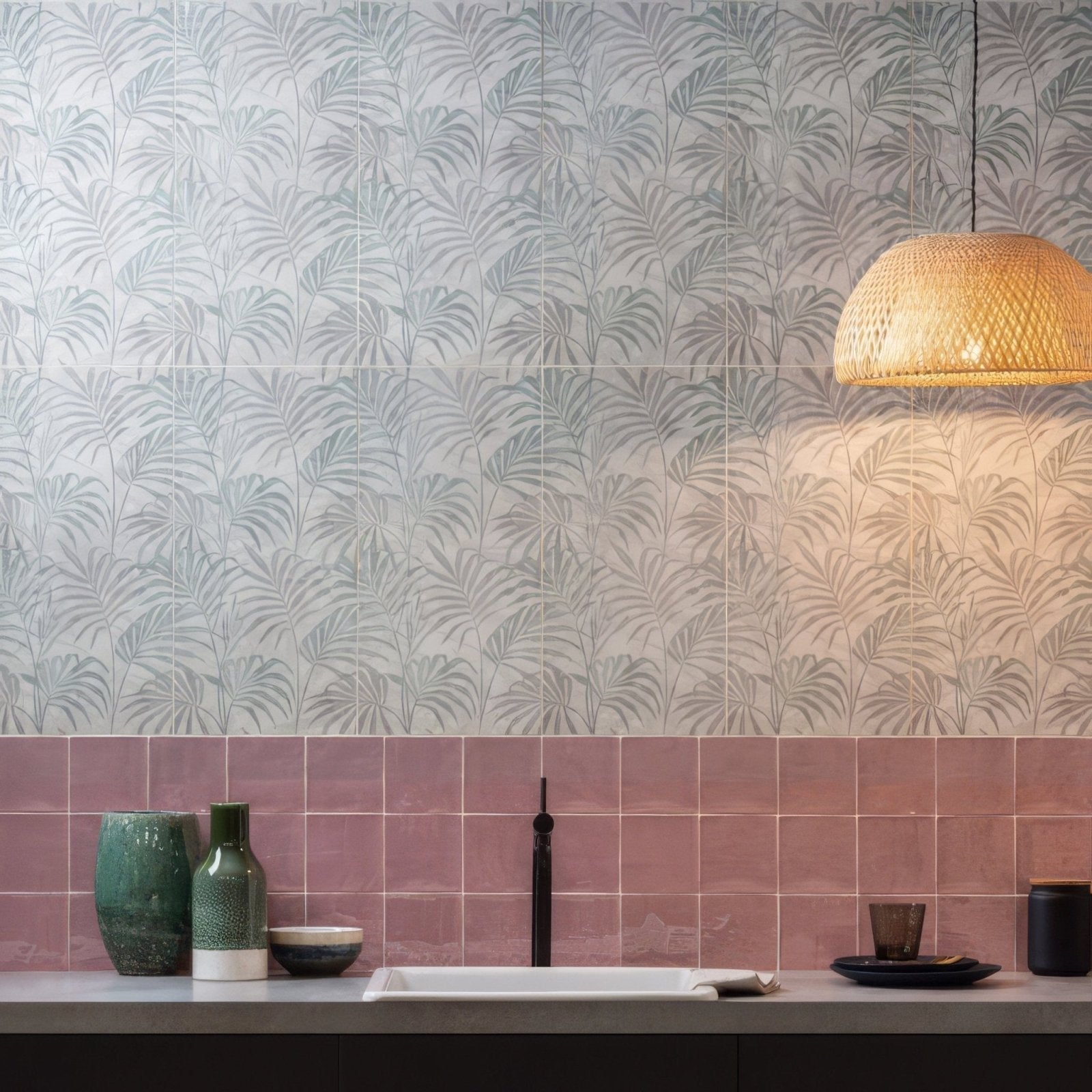 Blossom field tile wall featuring light gray palm leaf patterned tiles above soft pink rectangular tiles