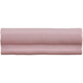 A sleek matte dusty rose ceramic blossom torus moulding tile with subtle glossy sheen and wave-like ridges