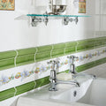 Chrome-finished cross-handle bathroom faucets with polished metallic finish and classic design on brilliant white base