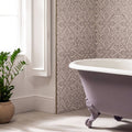 Lavender-colored clawfoot bathtub bohemia penelope 60x30cm with ornate sculpted feet and white porcelain interior
