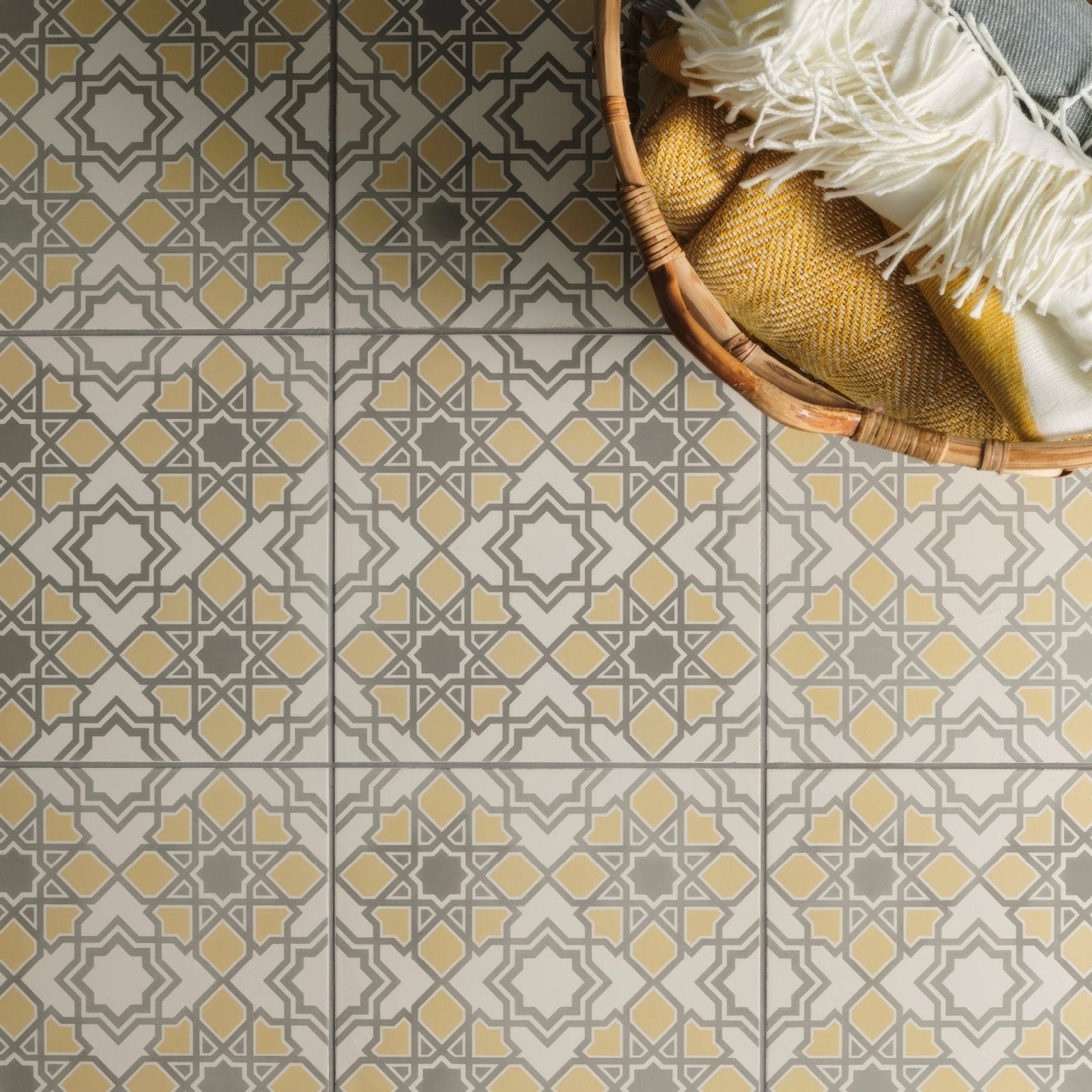 Geometric patterned floor tiles in cream mustard yellow and gray tones bolero yellow stone on chalk